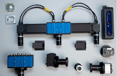 Exploded view of various Ensenso 3D cameras and camera lenses