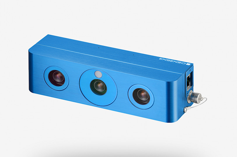 Ensenso 3D Kamera mit zwei Kameras und einem Projektor, eingehaust in einem blauen Aluminiumgehäuse.