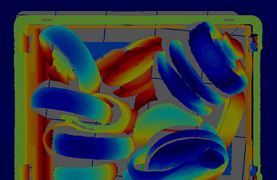 Thermal image of components lying in a box.